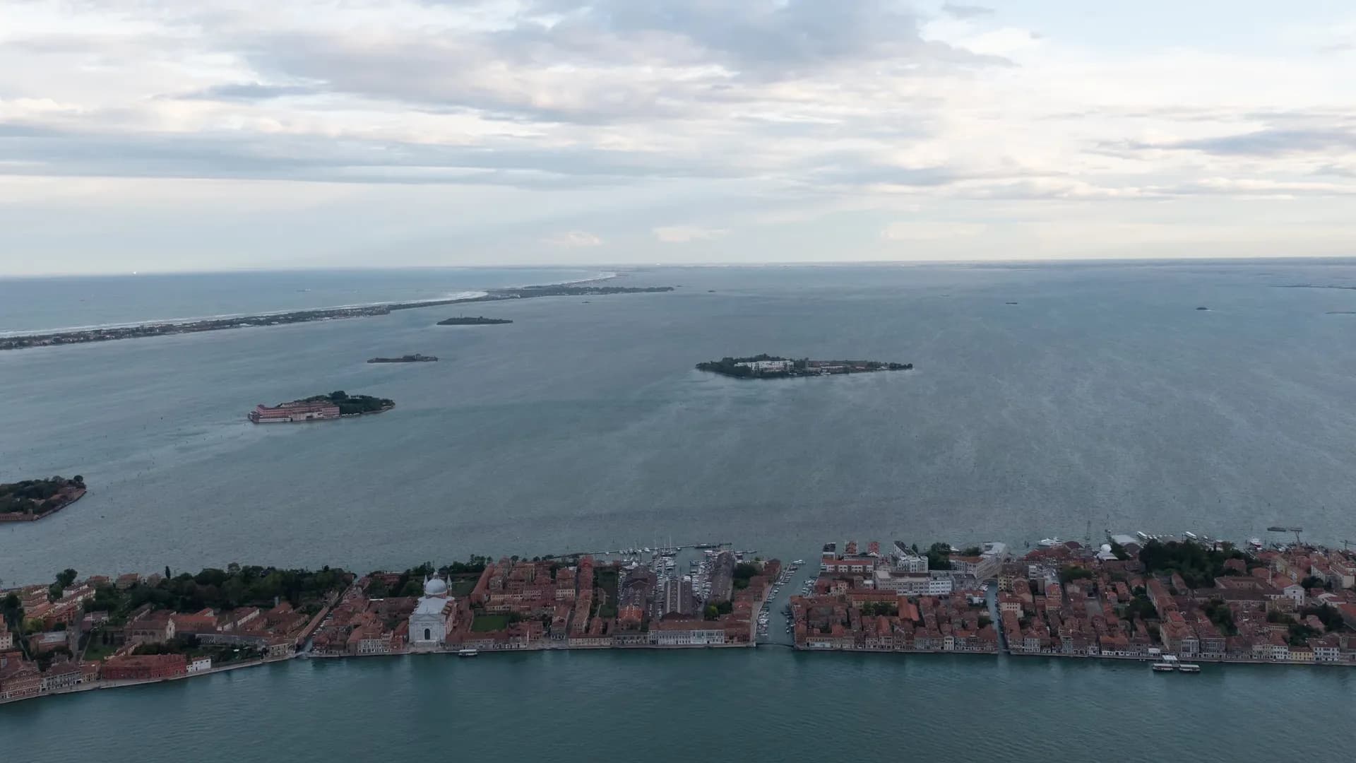 Aerial view of Venice, Italy with surrounding islands and water.